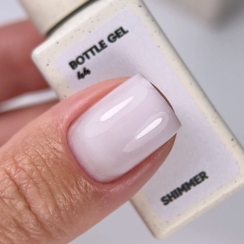 NAILSOFTHEDAY Bottle Gel 44 Shimmer — gel ultrarresistente blanco con shimmer plateado para reforzar las uñas, 10 ml