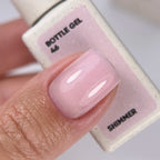 NAILSOFTHEDAY Bottle Gel 46 Shimmer — gel ultrarresistente rosa lechoso con shimmer plateado para reforzar las uñas, 10 ml