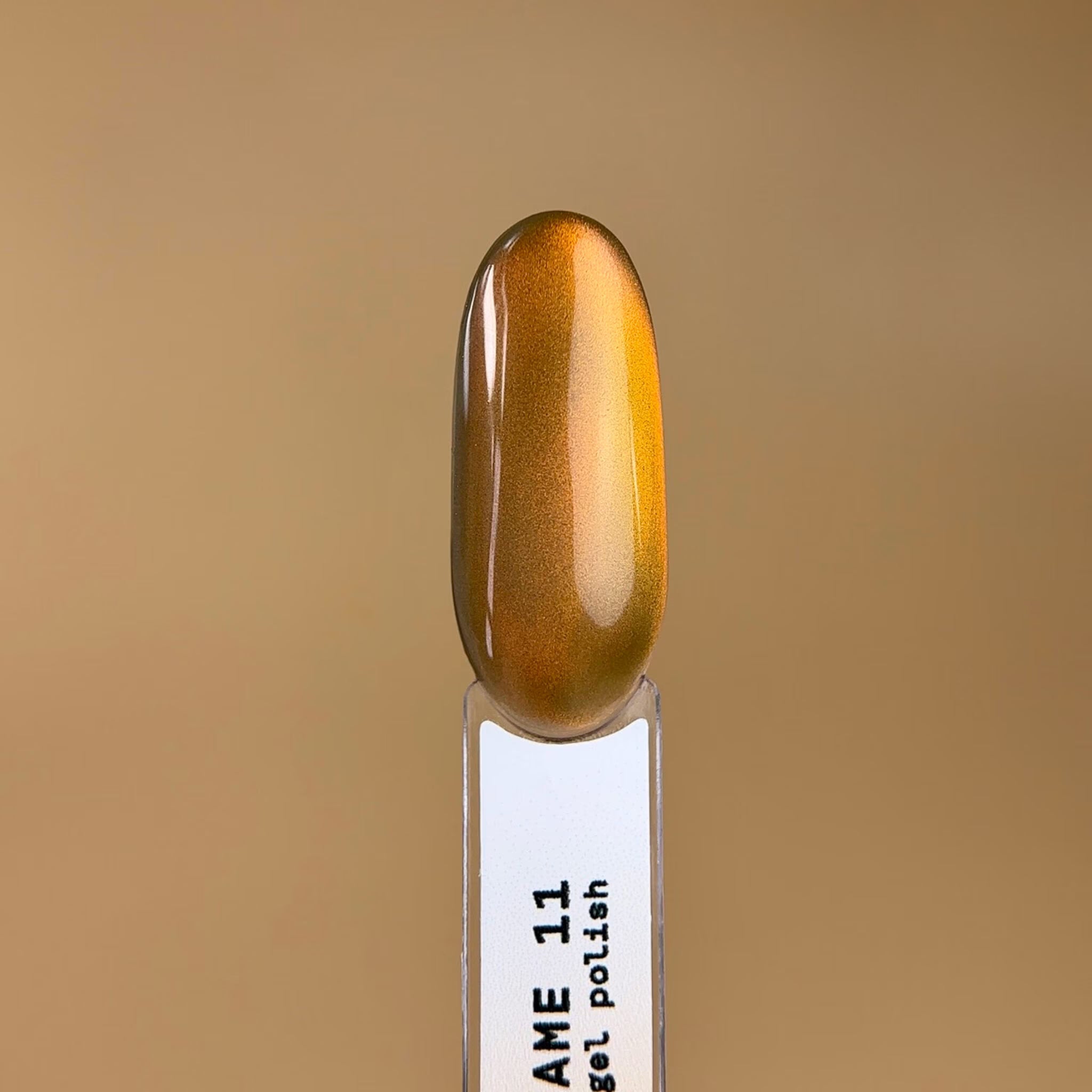 BIBLIOTEKA Esmalte Cat Eye Nº 11 Flame — Cobre anaranjado, 10 ml