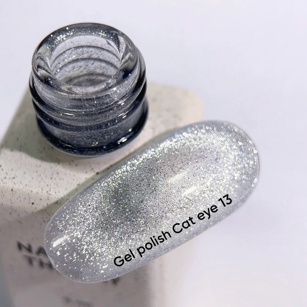 NAILSOFTHEDAY Gel Polish Cat Eye 13 – esmalte ojo de gato plateado sobre base transparente, 6 ml