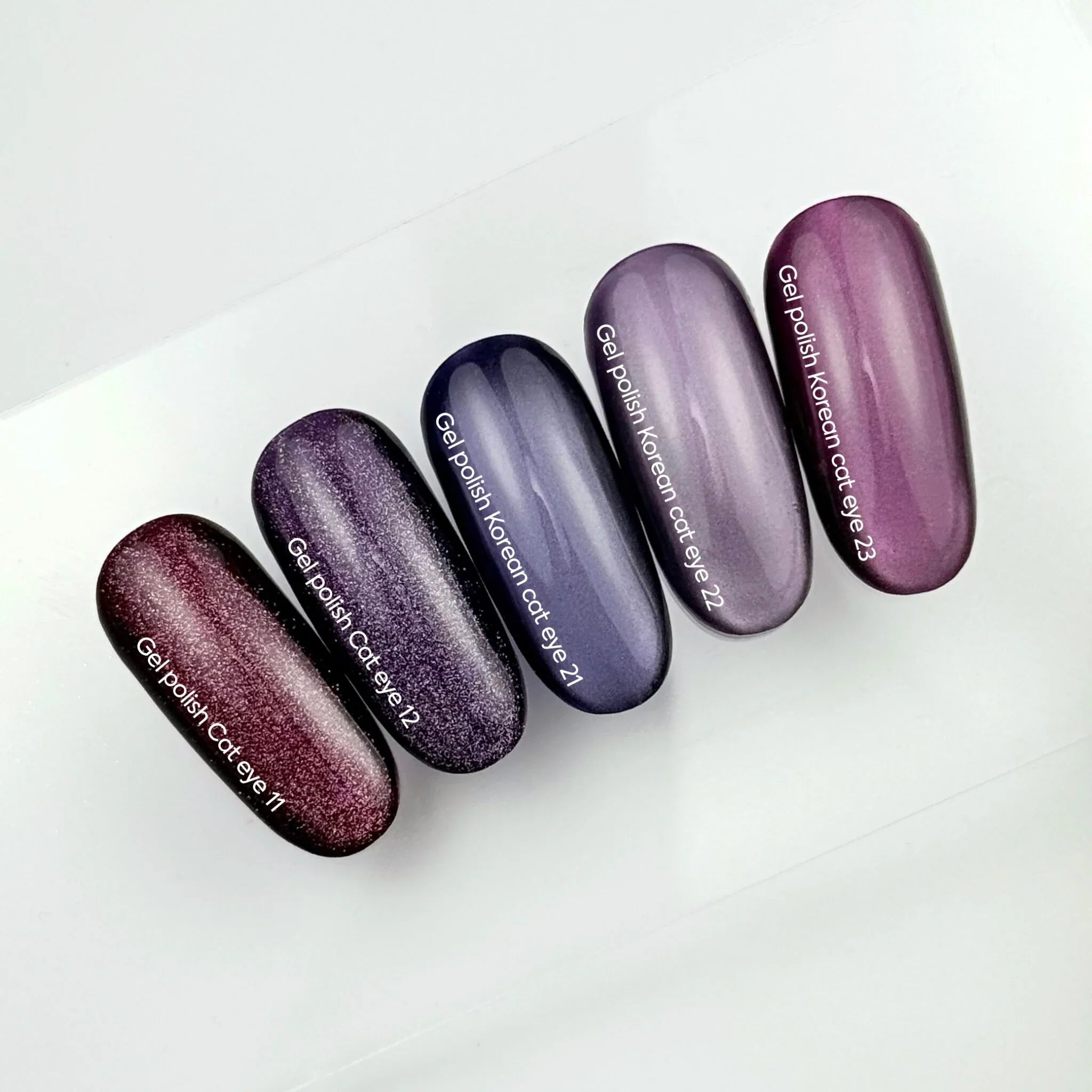 NAILSOFTHEDAY Korean Cat Eye 23 — esmalte efecto ojo de gato en tono rosa-violeta. 6 ml.