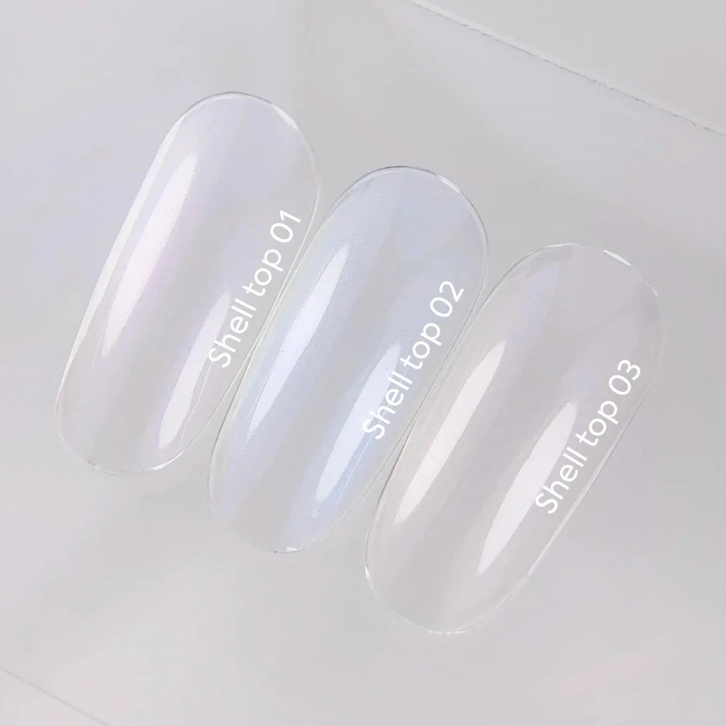 NAILSOFTHEDAY Shell Top 02 Nueva Fórmula — top perlado con efecto de frotado azul, sin capa pegajosa, 10 ml