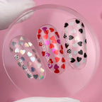 NAILSOFTHEDAY Kupidon Top 06 — top coat con corazones negros y blancos, sin capa pegajosa, 10 ml.
