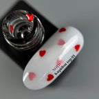 NAILSOFTHEDAY Kupidon top 01: top delicado para uñas con corazones de color rojo intenso y rosa, sin capa pegajosa, 10 ml