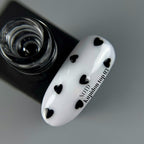 NAILSOFTHEDAY Kupidon top 03: top delicado para uñas con corazones negros intensos, sin capa pegajosa, 10 ml